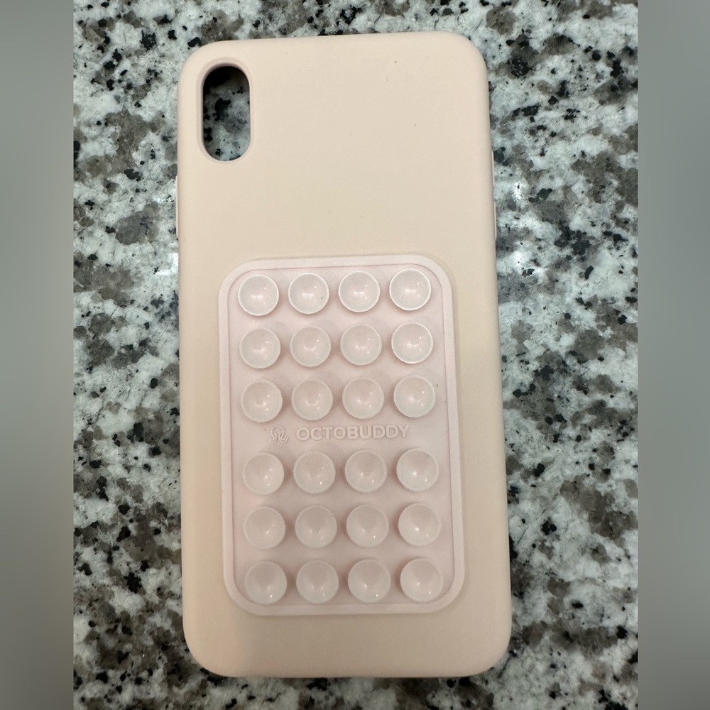 Light pink iPhone XS max case with OCTOBUDDY attached